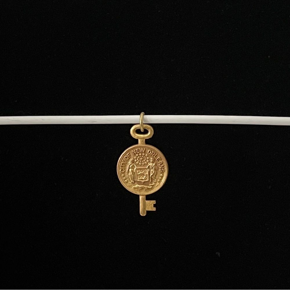 Vintage gold tone key.